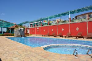Bazén v ubytování Hotel do Papai Noel nebo v jeho okolí