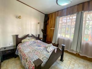 Cama o camas de una habitación en Casa Monte Fresco, Monteverde