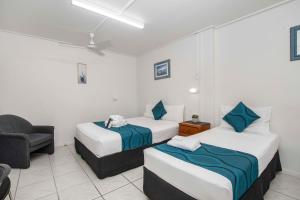 Postel nebo postele na pokoji v ubytování Strand Motel