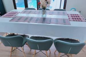 Area soggiorno di Spring Fields Homestay by Sizma