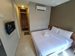 Ants Hotel客房内的一张或多张床位