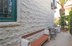 A balcony or terrace at Cozy Apartment In Marina Di Ragusa