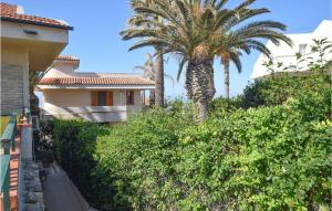 A garden outside Cozy Apartment In Marina Di Ragusa