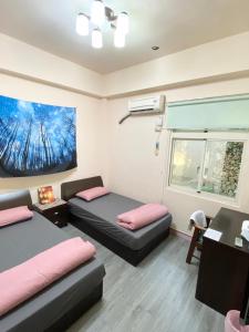 Postel nebo postele na pokoji v ubytování Myhome Homestay