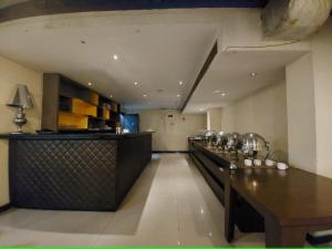 Kuchyň nebo kuchyňský kout v ubytování Orbit Hotel - Bagdogra