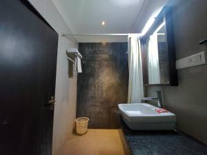Postel nebo postele na pokoji v ubytování Orbit Hotel - Bagdogra