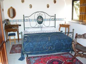 Ένα ή περισσότερα κρεβάτια σε δωμάτιο στο B&B Villa Bency