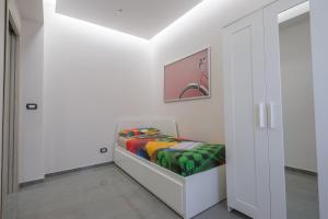 Postel nebo postele na pokoji v ubytování Appartamento a due passi dal mare