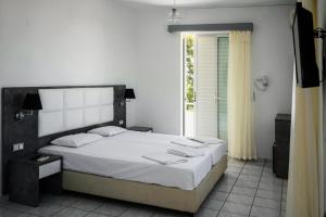 En eller flere senger på et rom på DM Apartments