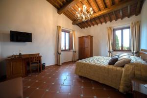 TV a/nebo společenská místnost v ubytování Agriturismo Il Dolce Vivere