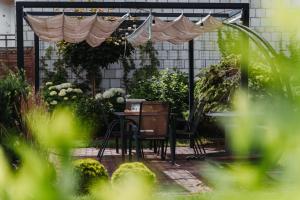 Vonkajšia záhrada v ubytovaní Willa Zaciszne Centrum Augustów