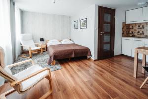 Posteľ alebo postele v izbe v ubytovaní Willa Zaciszne Centrum Augustów