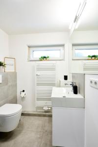 Koupelna v ubytování Modernes Apartment *Liobablick Nr. 5* - FeWo in Fulda/Petersberg + 10 fotografií