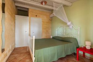Posteľ alebo postele v izbe v ubytovaní Villa Sunrise Palm