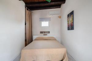 Posteľ alebo postele v izbe v ubytovaní Villa Sunrise Palm