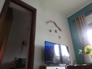 Televízia a/alebo spoločenská miestnosť v ubytovaní F.K Room 2