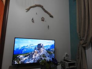 Televízia a/alebo spoločenská miestnosť v ubytovaní F.K Room 2