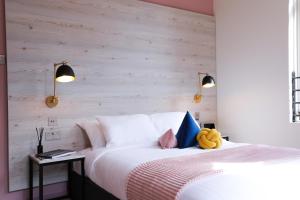 Postel nebo postele na pokoji v ubytování Revolver