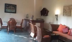 Χώρος καθιστικού στο Rambutan Hotel