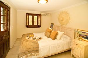 Postel nebo postele na pokoji v ubytování R&G luxury accommodation Kalymnos villa