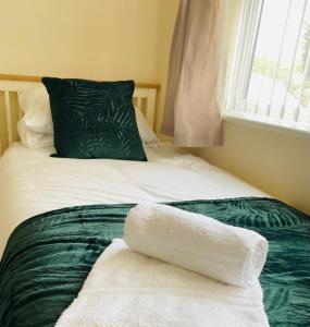 Un ou plusieurs lits dans un hébergement de l'établissement Lindeburgh Retreat