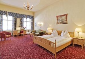 Posteľ alebo postele v izbe v ubytovaní Hotel Mader