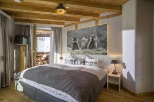 A bed or beds in a room at Appartement Murmele