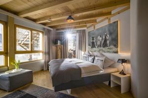 A bed or beds in a room at Appartement Murmele