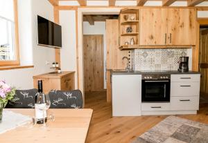 A kitchen or kitchenette at Appartement Murmele