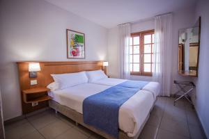 Postel nebo postele na pokoji v ubytování Caybeach Princess
