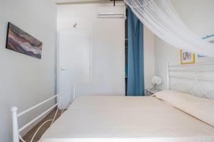 Posteľ alebo postele v izbe v ubytovaní Villa Sunrise Palm