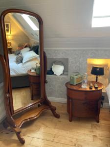 Voodi või voodid majutusasutuse Ivy Cottage B&B toas