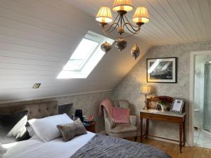 Voodi või voodid majutusasutuse Ivy Cottage B&B toas