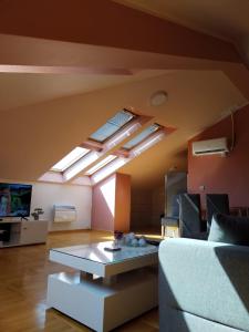 Μια τηλεόραση ή/και κέντρο ψυχαγωγίας στο Loft apartman