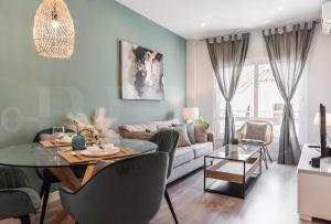 A seating area at Sunny & modern apartment - Center by REMS