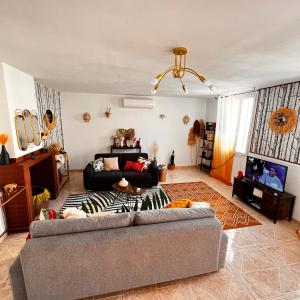 Posedenie v ubytovaní Ancien corps de ferme 3 chambres avec spa