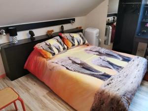 Postel nebo postele na pokoji v ubytování Hôtel Le Bambi