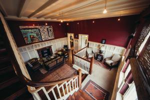 an overhead view of a living room with red walls at Villa Margherita in Swakopmund