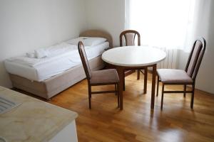 Voodi või voodid majutusasutuse EA Apartmány Mozart toas