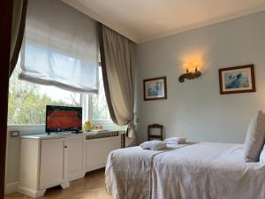 Ліжко або ліжка в номері Hotel David