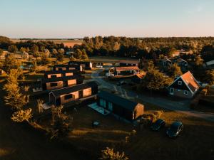 an aerial view of a small town with a building at Tiny house XXL in Bant
