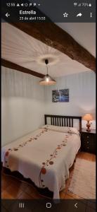 Кровать или кровати в номере Casa jardin Mariana