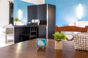 a table with a glass on top of a room at Secret Rooms in Rovinj +13 photos