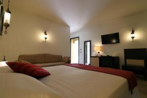 RIAD Comfort Rooms客房内的一张或多张床位