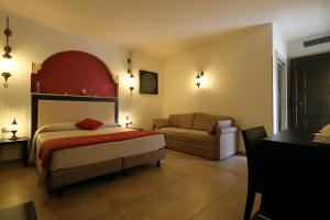 RIAD Comfort Rooms客房内的一张或多张床位