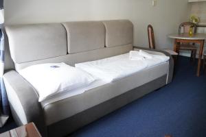 Voodi või voodid majutusasutuse EA Apartmány Mozart toas