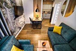 Kuchyň nebo kuchyňský kout v ubytování Capital apartaments