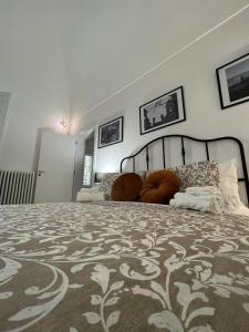 Postel nebo postele na pokoji v ubytování Palazzo Zagarella HOWME