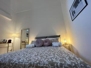 Postel nebo postele na pokoji v ubytování Palazzo Zagarella HOWME