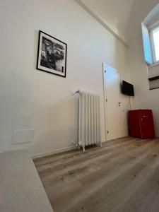 TV a/nebo společenská místnost v ubytování Palazzo Zagarella HOWME